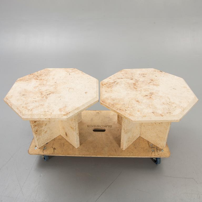 A pair of travertine side tables later part of the 20th century.