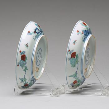 A pair of 'butterfly and peonies' dishes, Qing dynasty with Yongzheng mark.