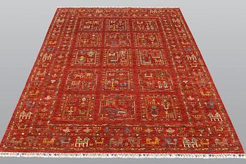 A rug, Ziegler design figural, ca 235 x 168 cm.