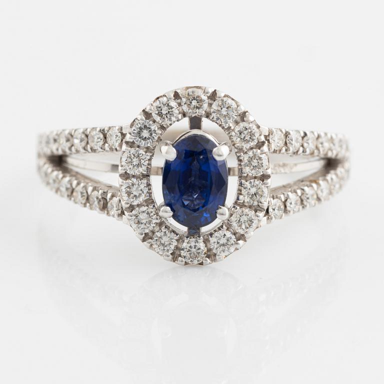 Oval sapphire and brilliant cut diamond ring.