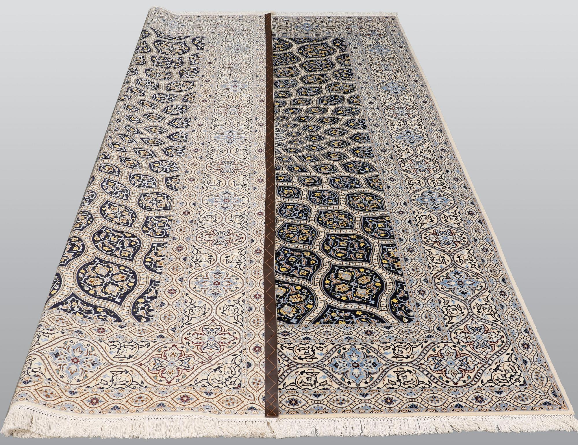A part silk Nain carpet, so called 6 LAA, ca 306 x 215 cm.