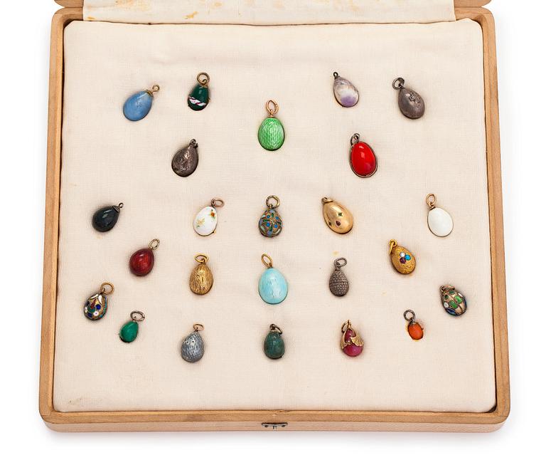 A collection of 24 egg pendants in original wooden box, Russia, early 20th century.