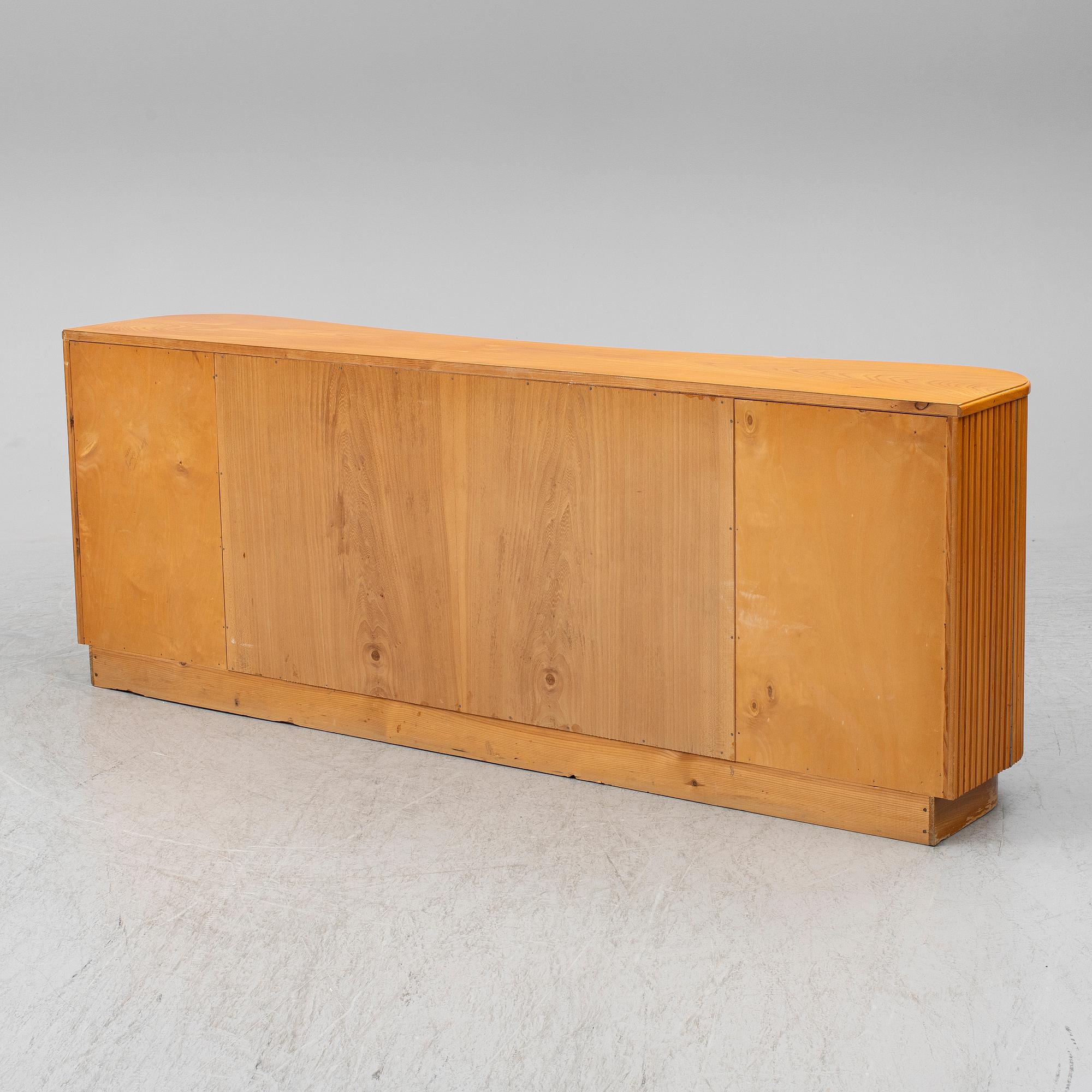 A 1940s elm veneered shelf.