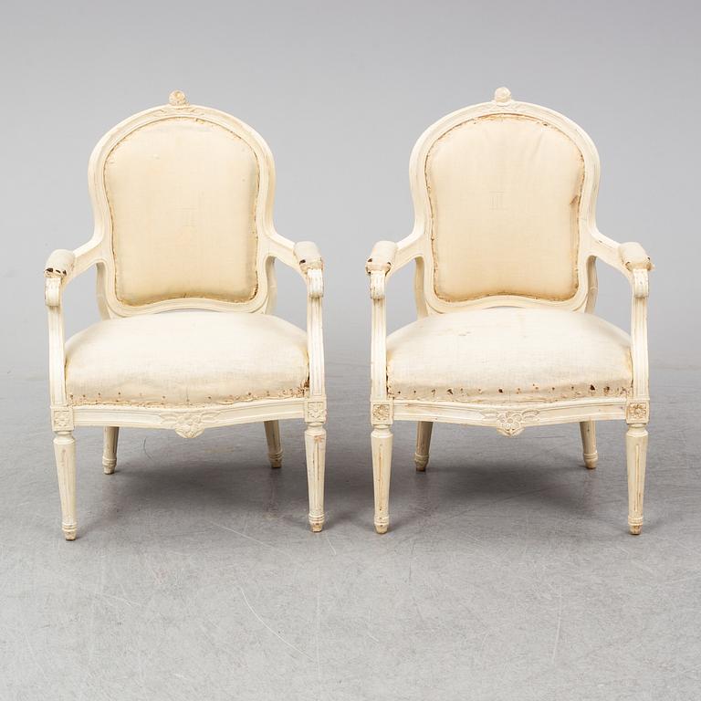 A first half of the 20th Century Gustavian style armchairs.