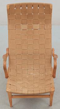 A Bruno Mathsson beech and canvas easy chair, Karl Mathsson, Värnamo, Sweden 1940's.