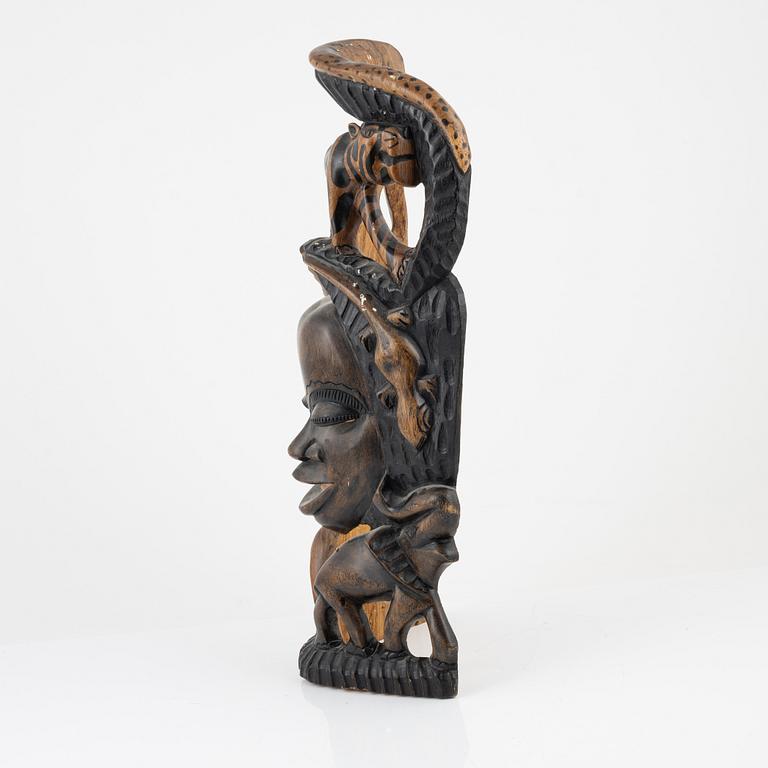 A wooden mask, Gambia, 21st Century.