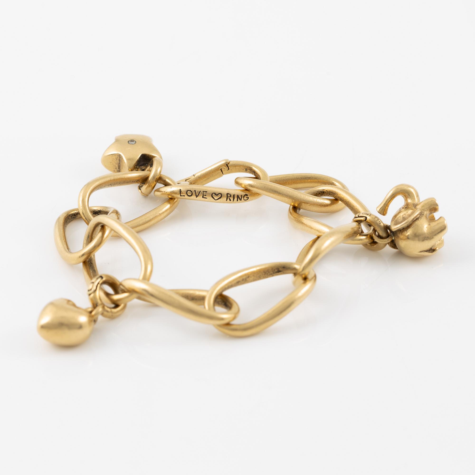 Charlotte Lynggaard, Ole Lynggaard, armband, 18K guld med berlocker i form av elefant, stjärna och hjärta.