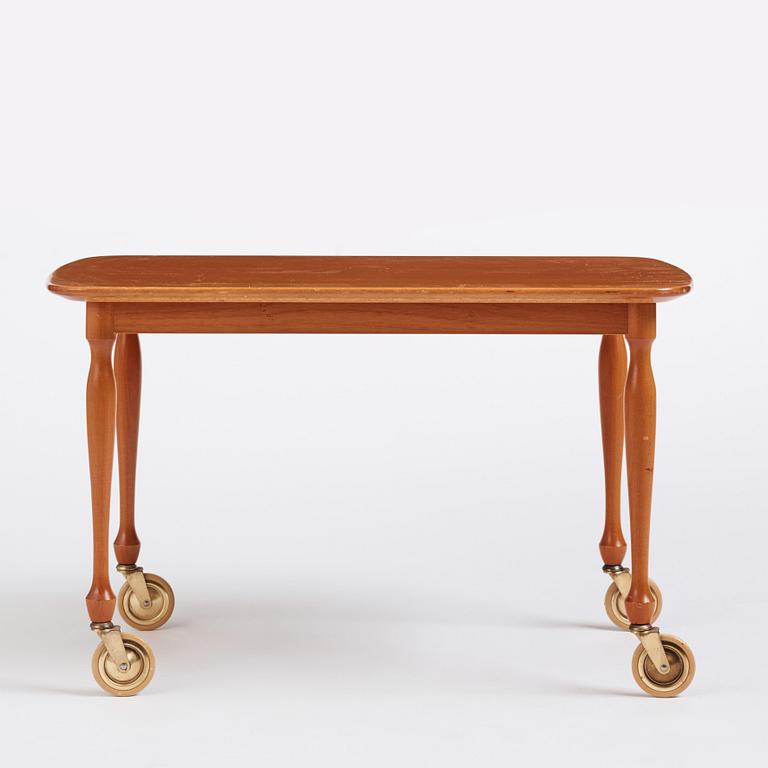 Josef Frank, a mahogany table, model "B 2142", Firma Svenskt Tenn, Sweden 1950s-60s.