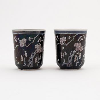 A pair of famille noire cups, Qing dynasty, 19th Century.