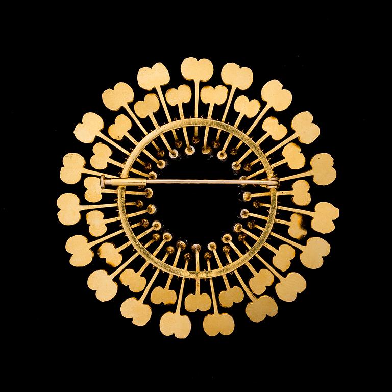 TAPIO WIRKKALA, brosch "Diamantsol", 14K guld,  briljantslipade diamanter. Kultakeskus 1974.