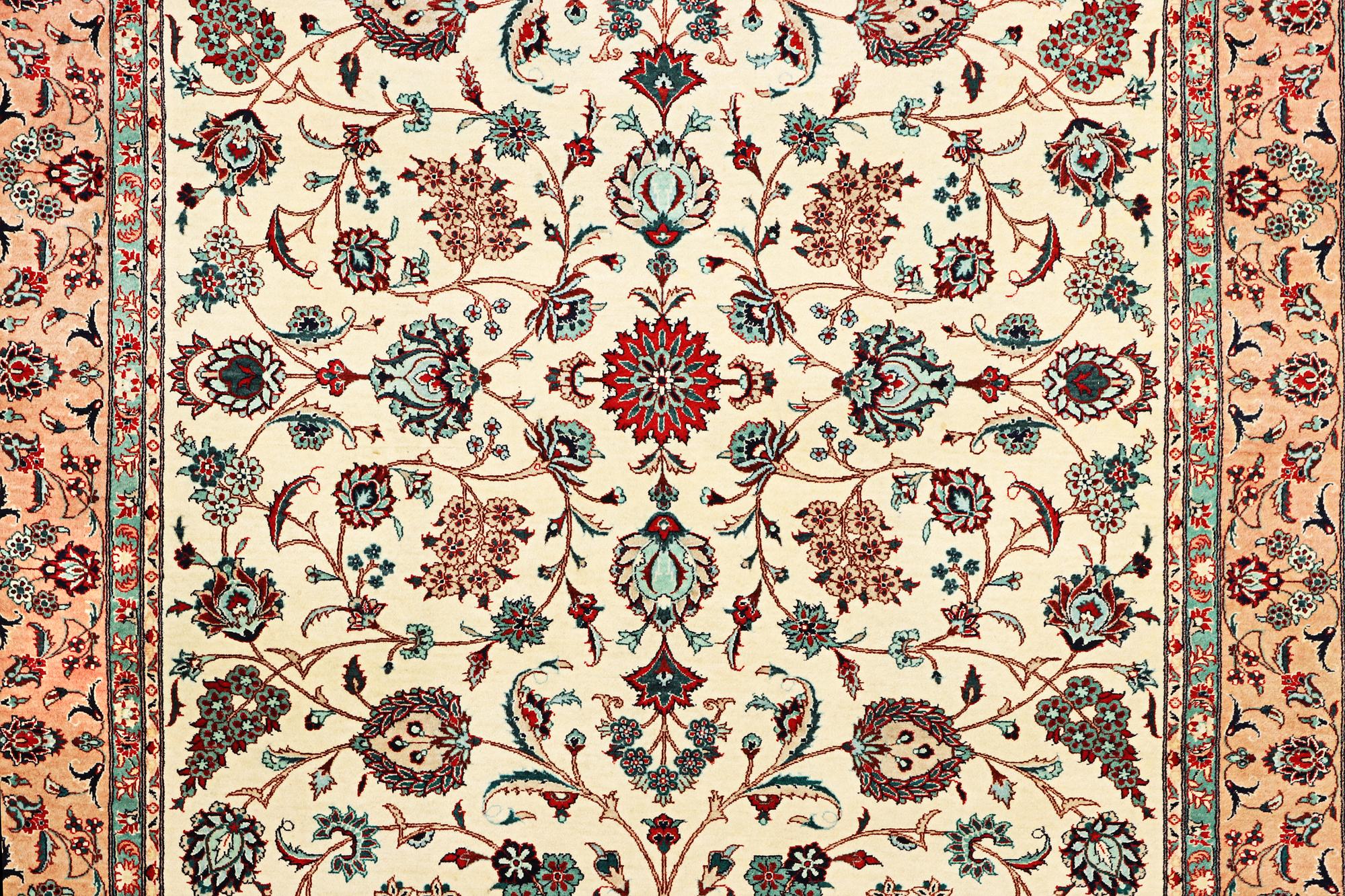 An oriental silk carpet, a. 280 x 185 cm.