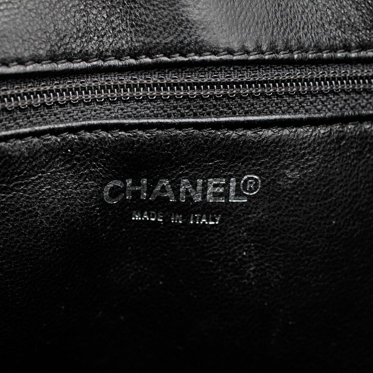 CHANEL, a black leather "Shopping" handbag.