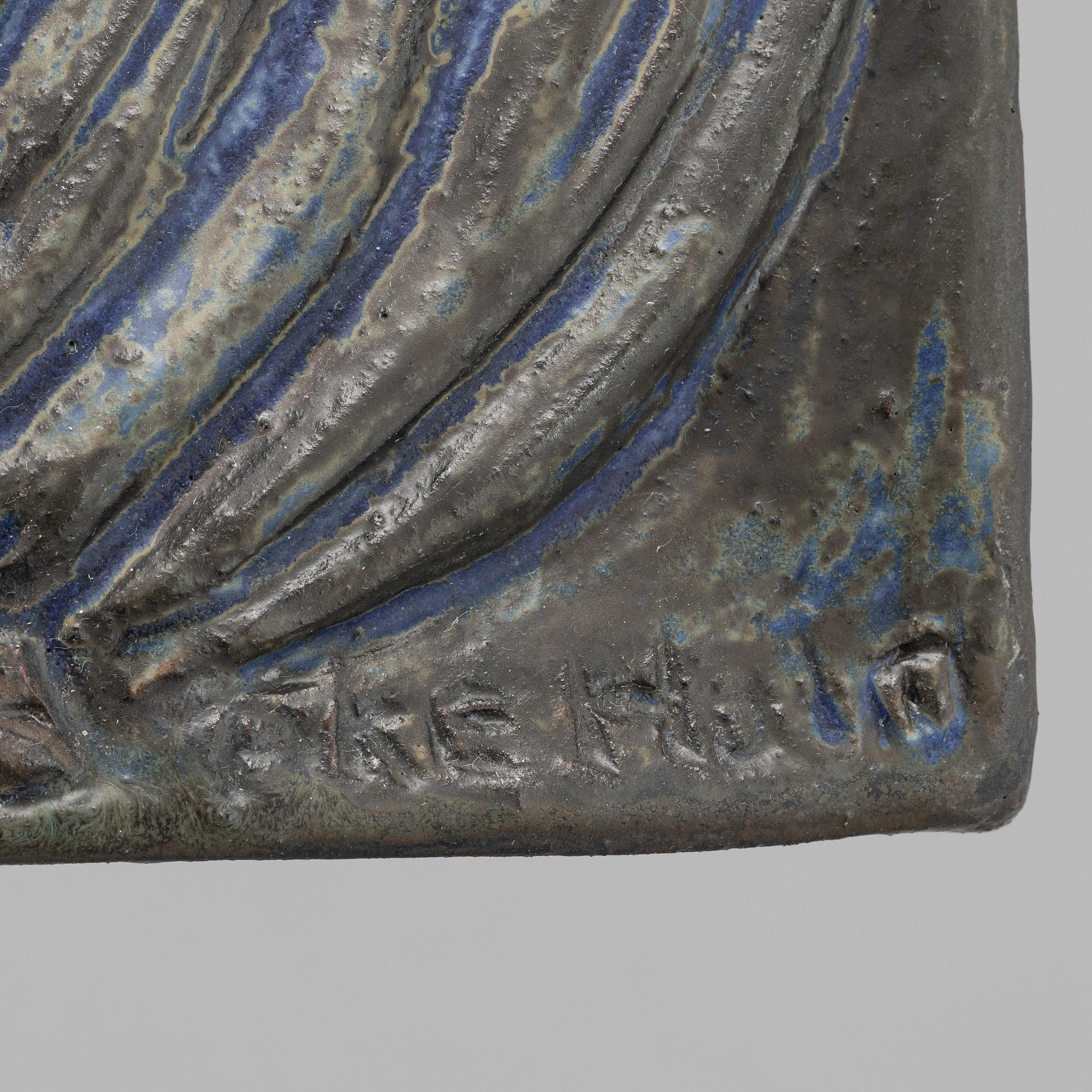 Åke Holm, a stoneware wall relief, signed.