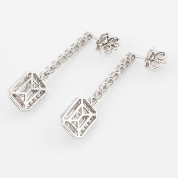 Earrings with baguette and brilliant cut diamonds.