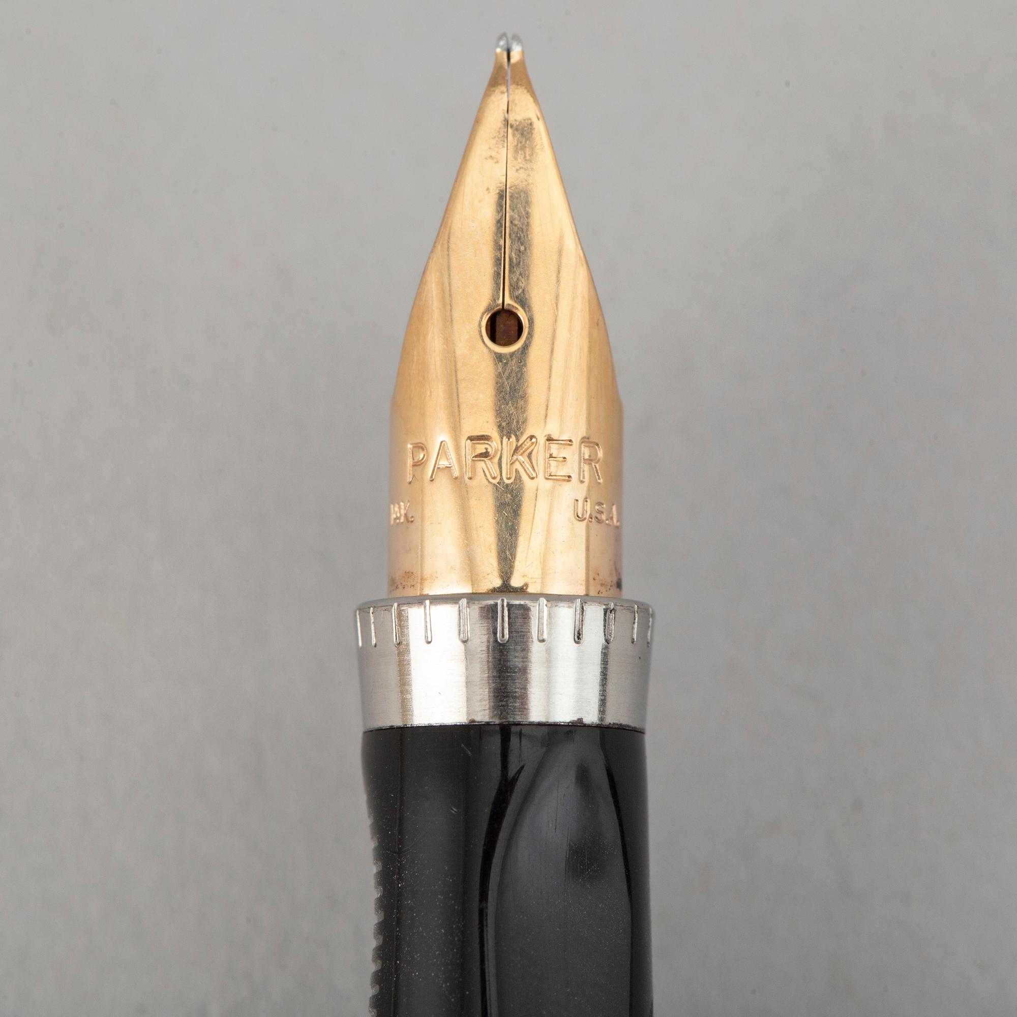 PARKER, a sterling silver fountain pen.