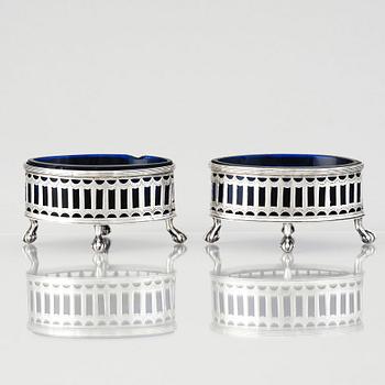 A Swedish pair of early 19th Century silver and blue glass salt cellars, mark of Pehr Zethelius, Stockholm 1808.