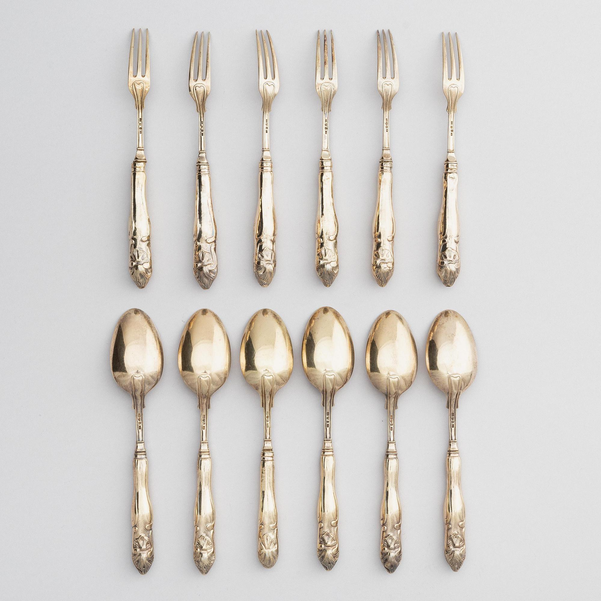 Firma Gustav Möllenborg, 6 skedar och 6 gafflar, förgyllt silver, Stockholm 1888-1891. Nyrokoko.