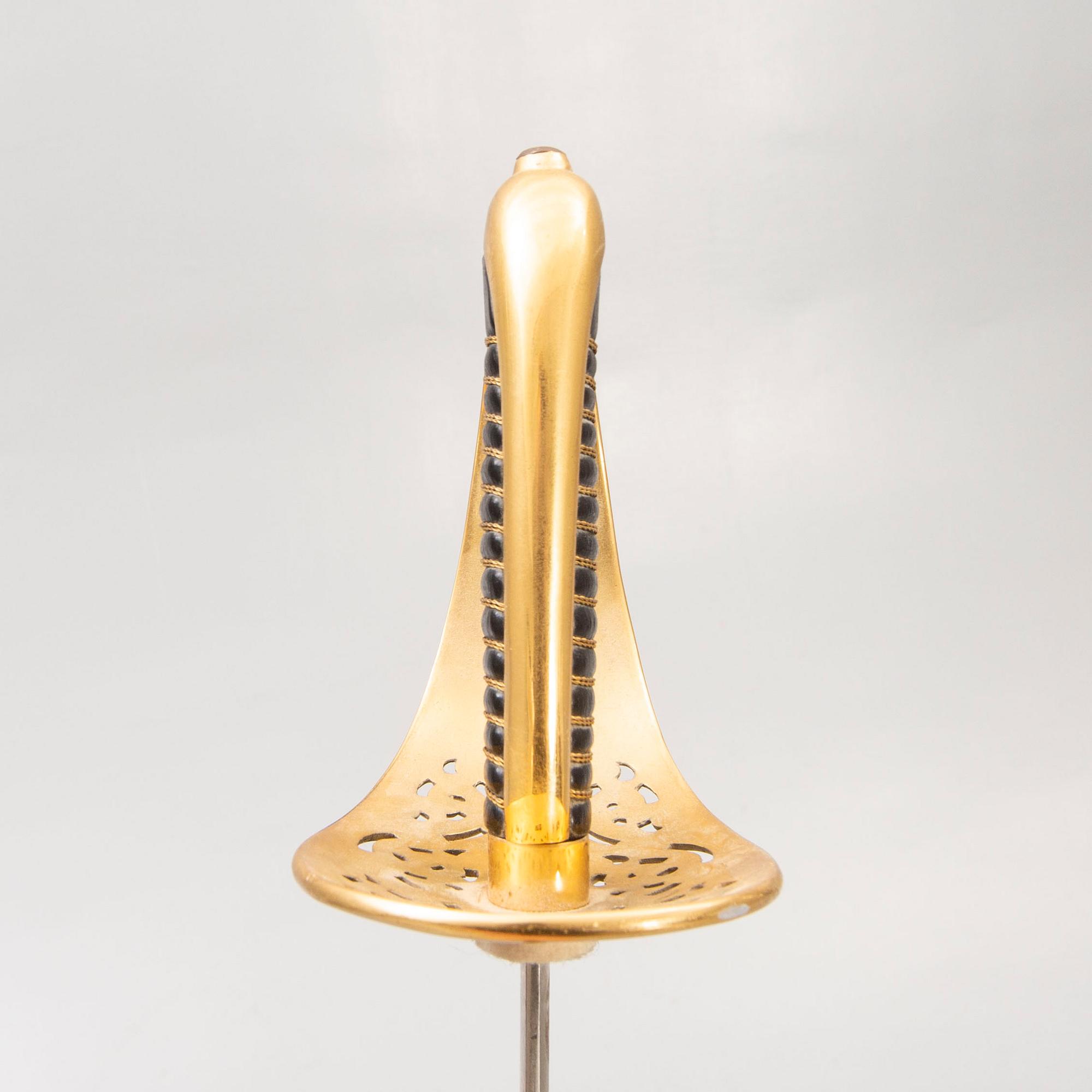 A cavalry officer's sword, 1893 pattern, with scabbard.