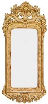 911. A Swedish Rococo mirror by N. Sundström.