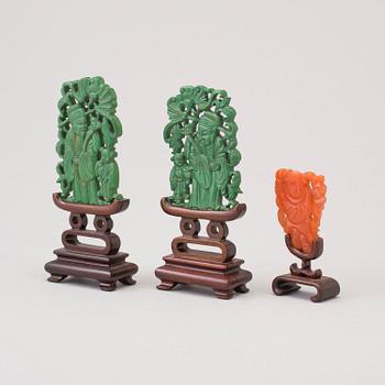 Three Chinese 20th century sculptures on stand, wood and agathe.