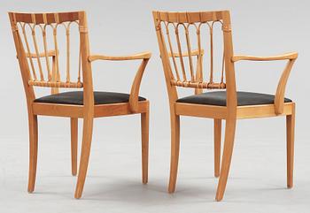 A pair of Josef Frank mahogany and rattan armchairs, Svenskt Tenn, model 1165.