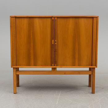 A Walnut veneered cabinet, 1950's/60's.