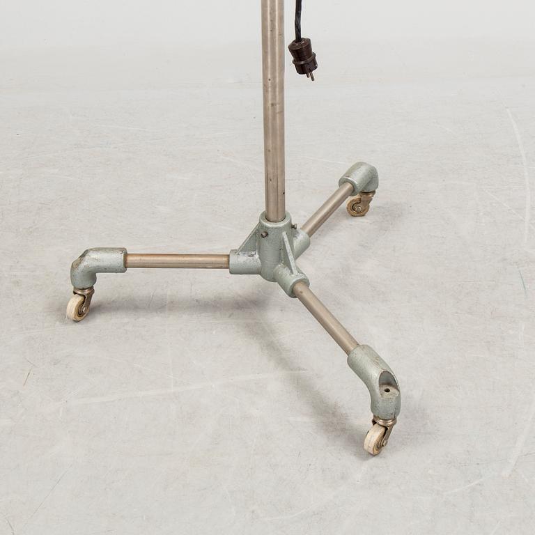 A German metal floor light from the mid 20th century.