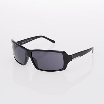 Two Pairs of Sunglasses, Prada and Chanel.