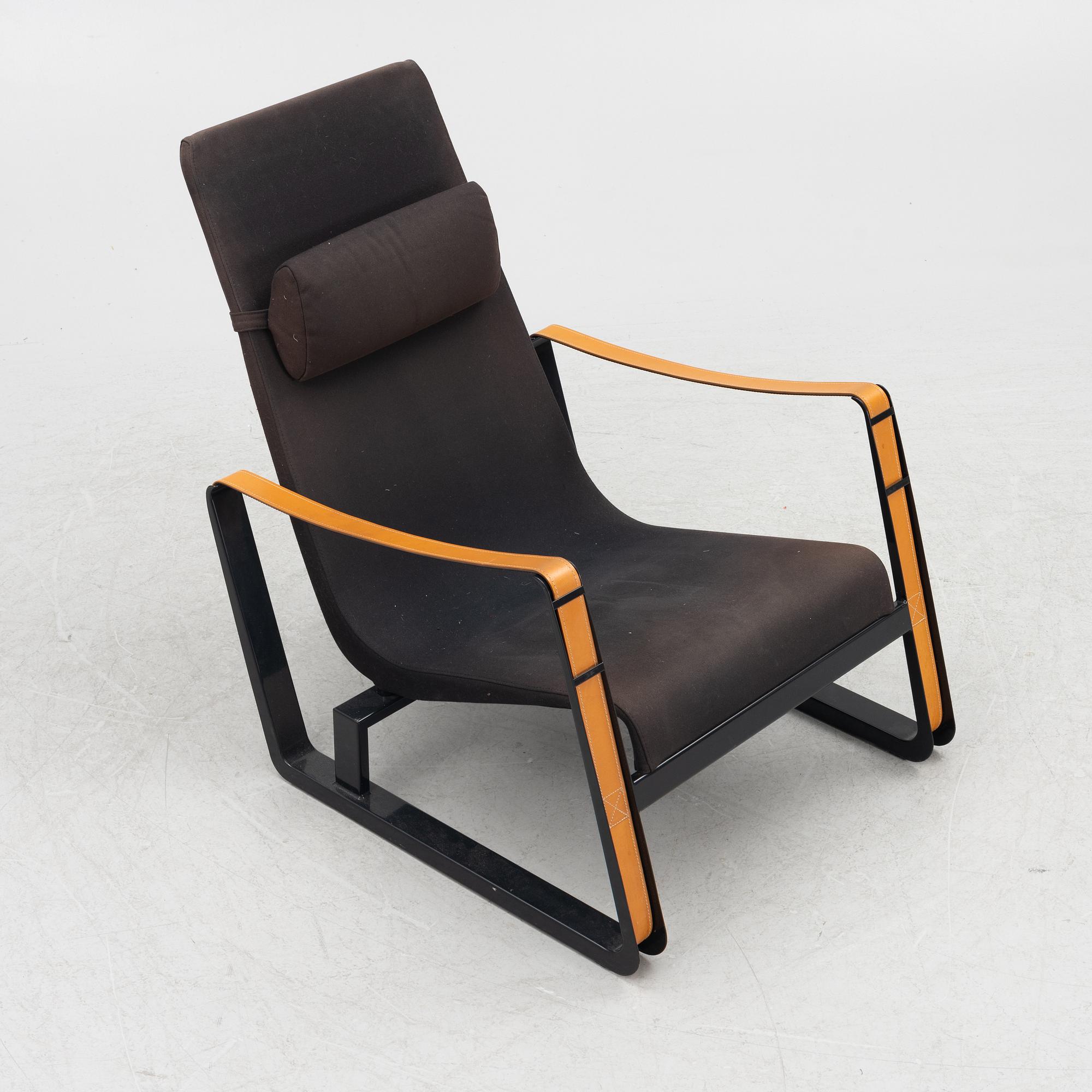 Jean Prouvé, a 'Cité' easy chair, Vitra, 2012.
