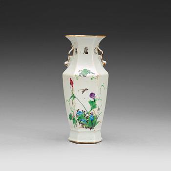 A hexagonal vase enameled with flowers and calligraphy, Republic era (1912-1949).