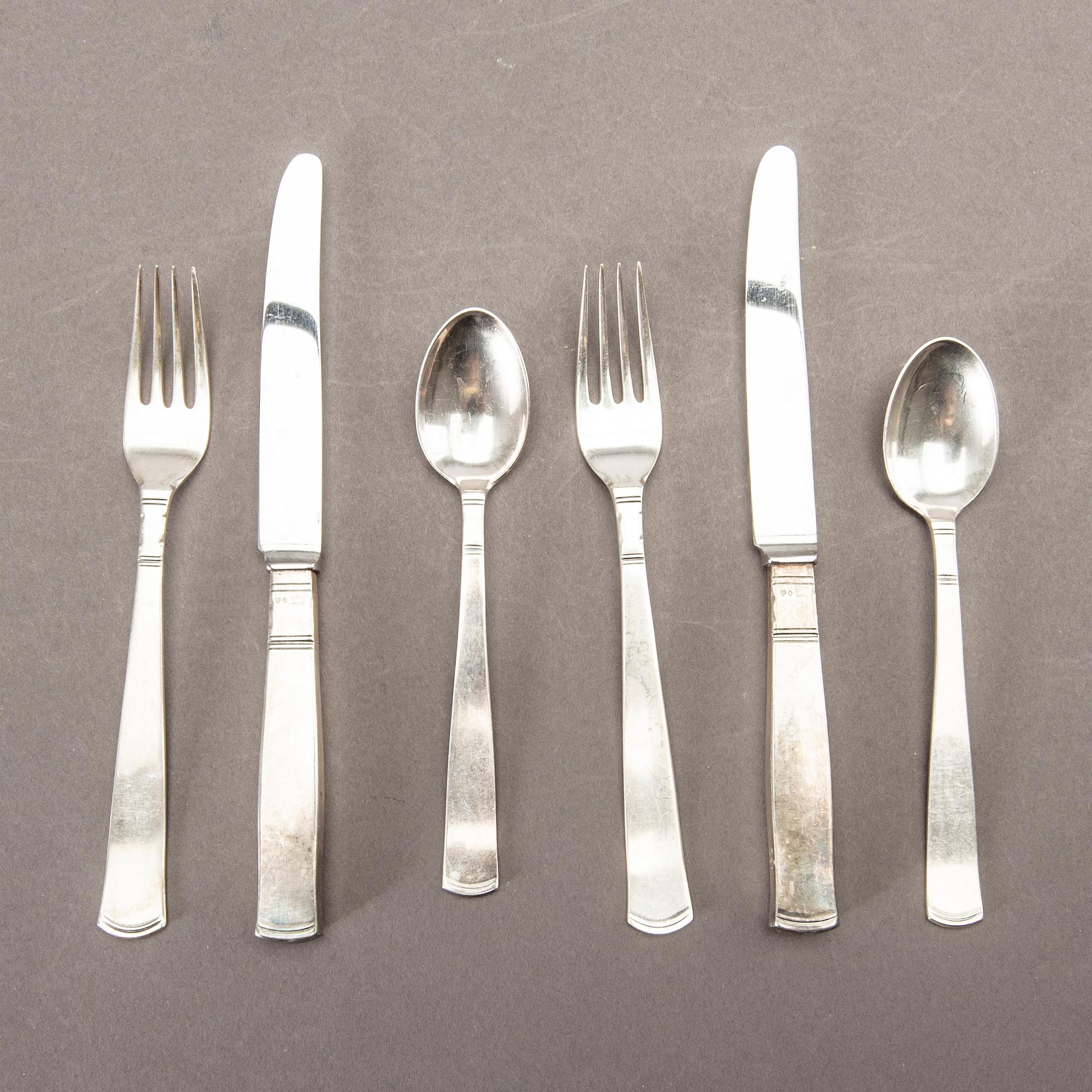A Swedish 20th set of 36 pcs silver cutlery mark of J Ängman GAB Stockholm 1690/70s, weight ca 980 gr.