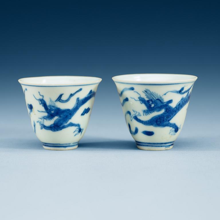 Two blue and white wine cups, Ming dynasty, Transition/Chongzhen (1628-44).