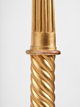 A pair of late Gustavian giltwood torchères by J. Frisk (master in Stockholm 1805-24).