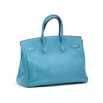 HERMÈS, a tourillon clemence blue jean handbag, "Birkin 35".