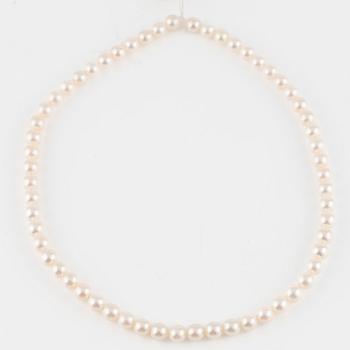 Three strands of cultured pearls, without clasps.