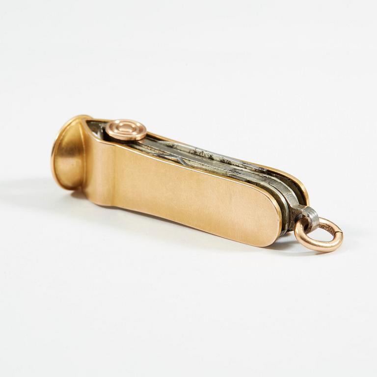 A Russian 20th century gold and metal cigar-cutter, unidentified makers mark, St. Petersburg 1908-1917.