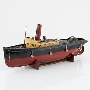 A ships model of a tugboat for a steam engine.