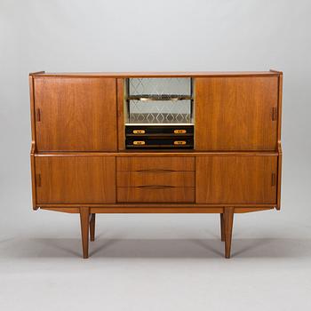 A Danish 1950s-60s cabinet with bar compartment.