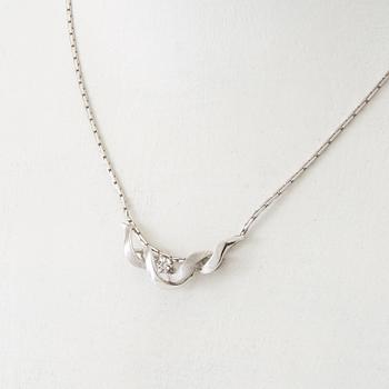 Necklace 18K white gold with a round single-cut diamond.