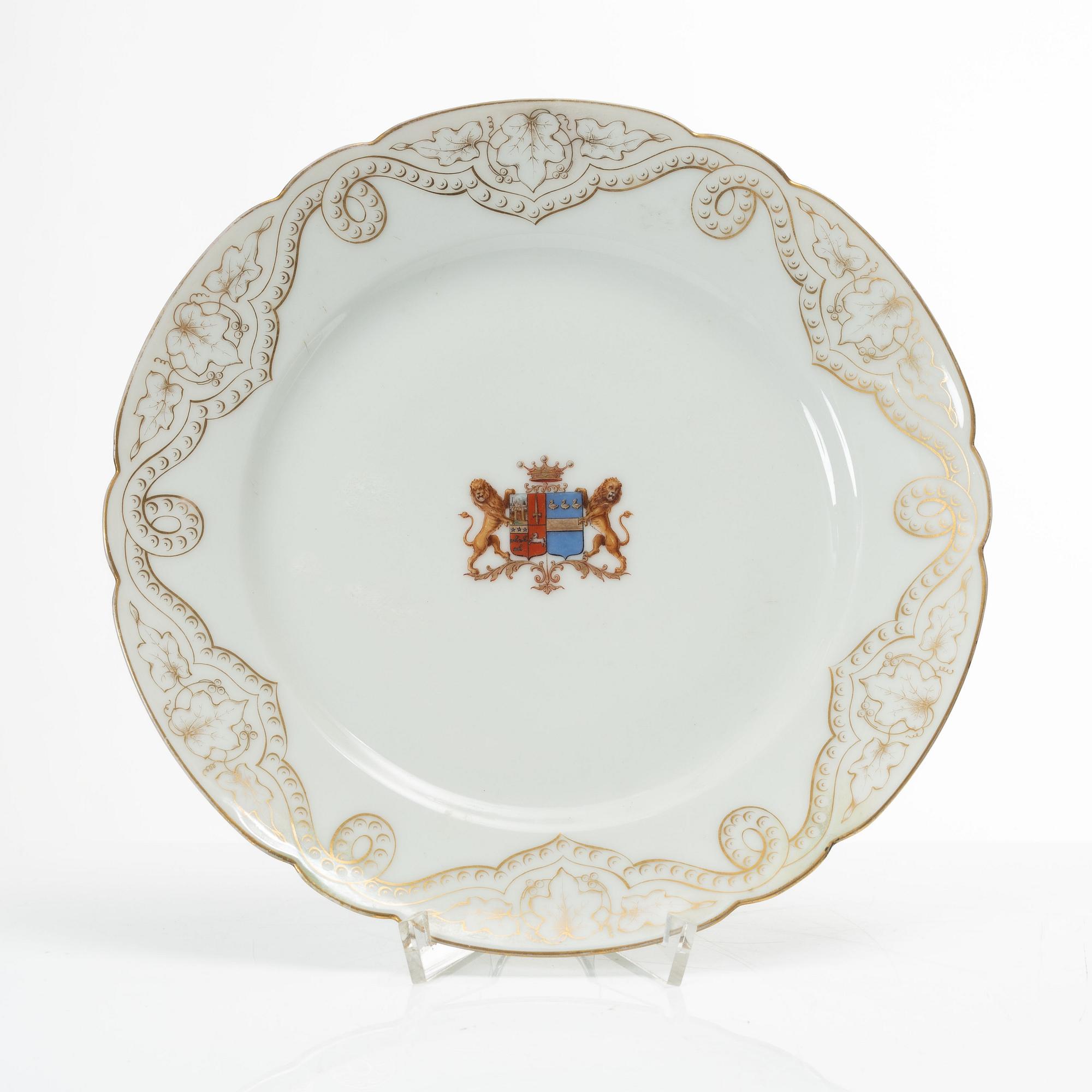 A group of three armorial dinner plates, presumably France, late 19th century.
