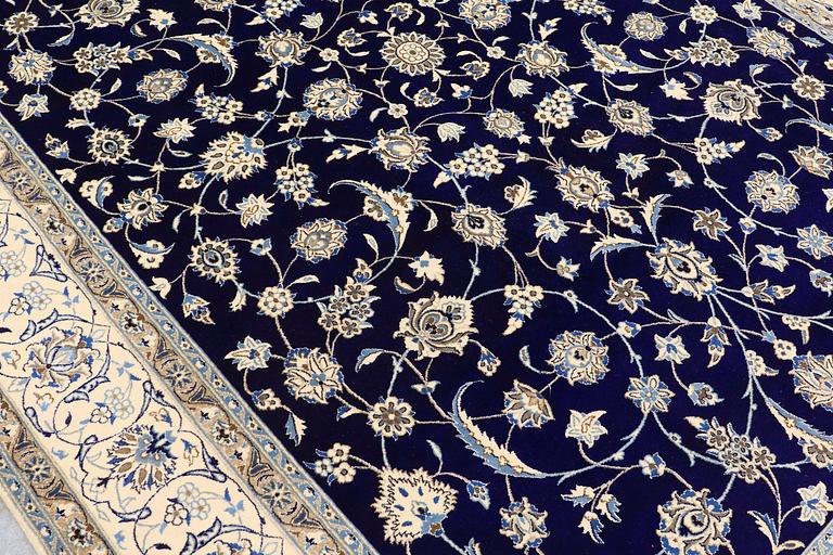 A carpet, Nain part silk, 350 x 250 cm.