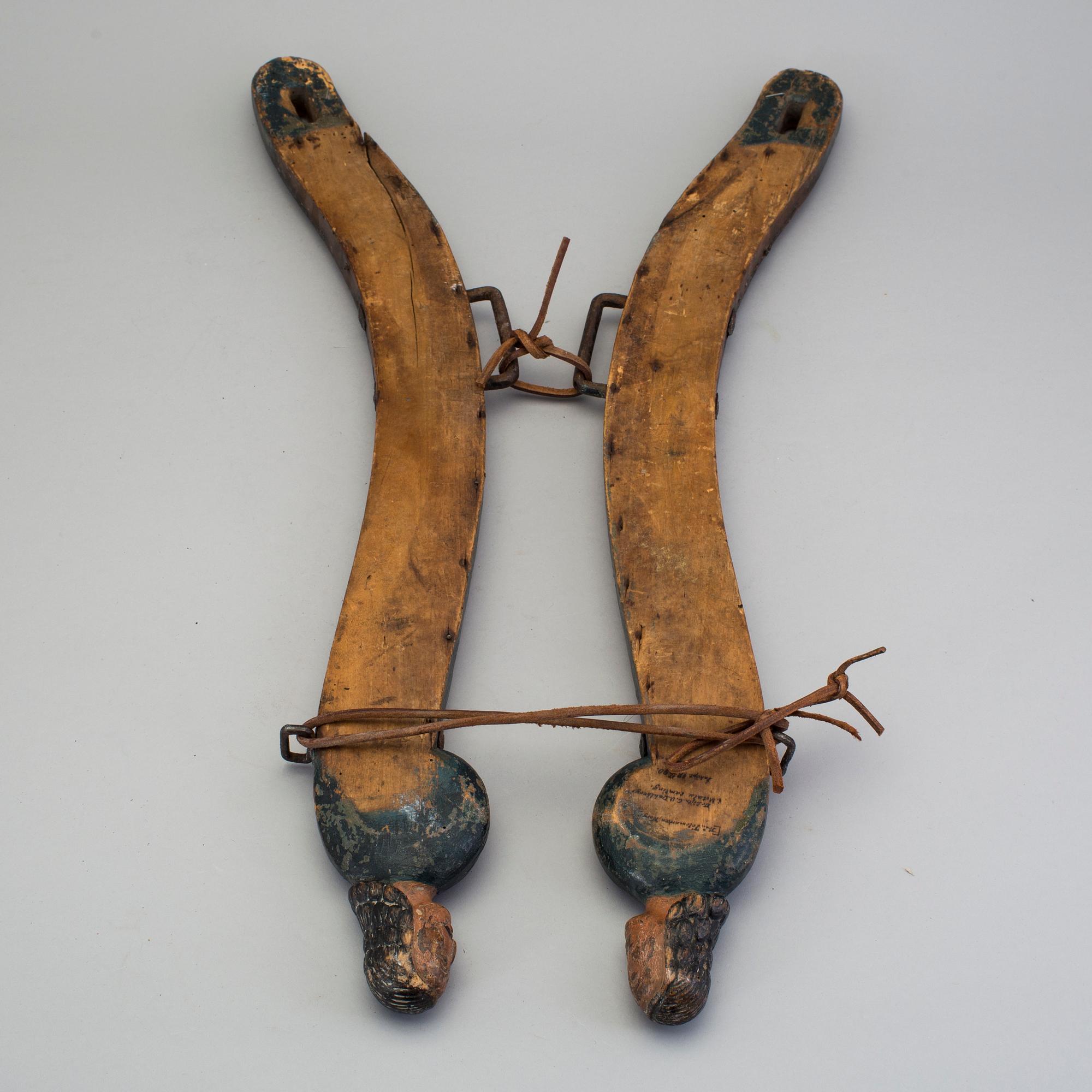 A three piece carved and painted folk art horse hame 18/19th century.