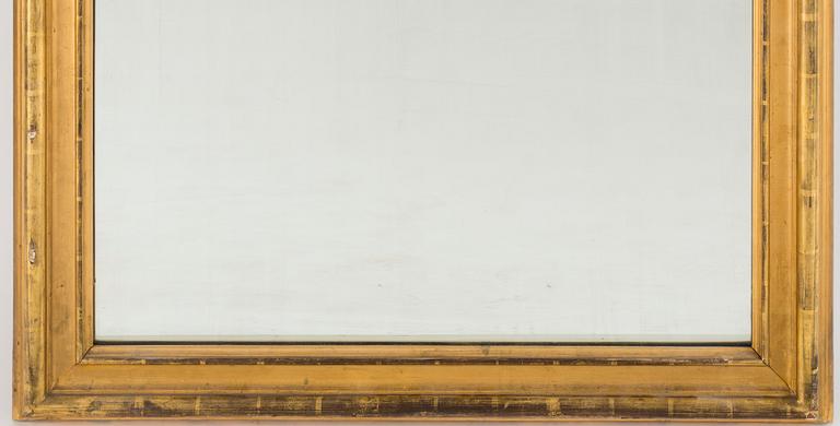 A gilt wood mirror and marble top console table, early 20th Century.