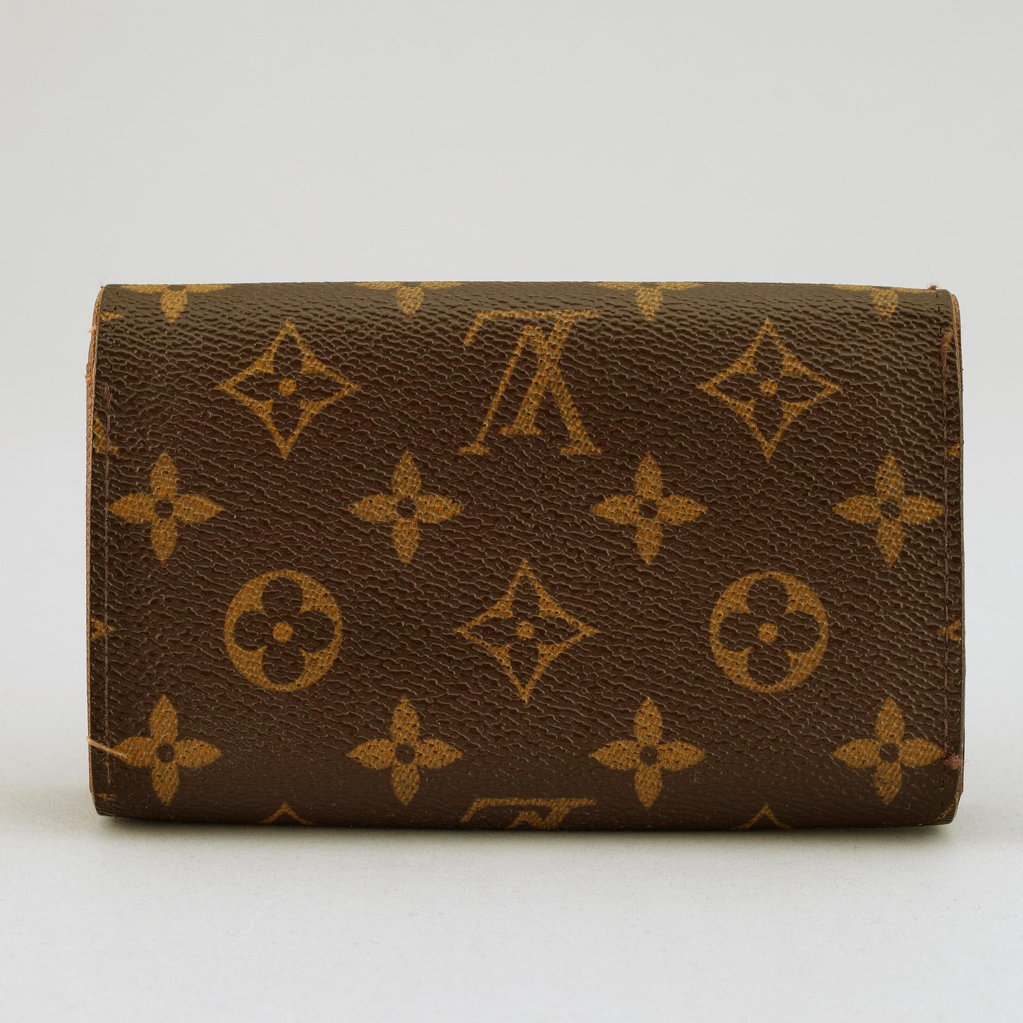 LOUIS VUITTON, a monogram canvas wallet.