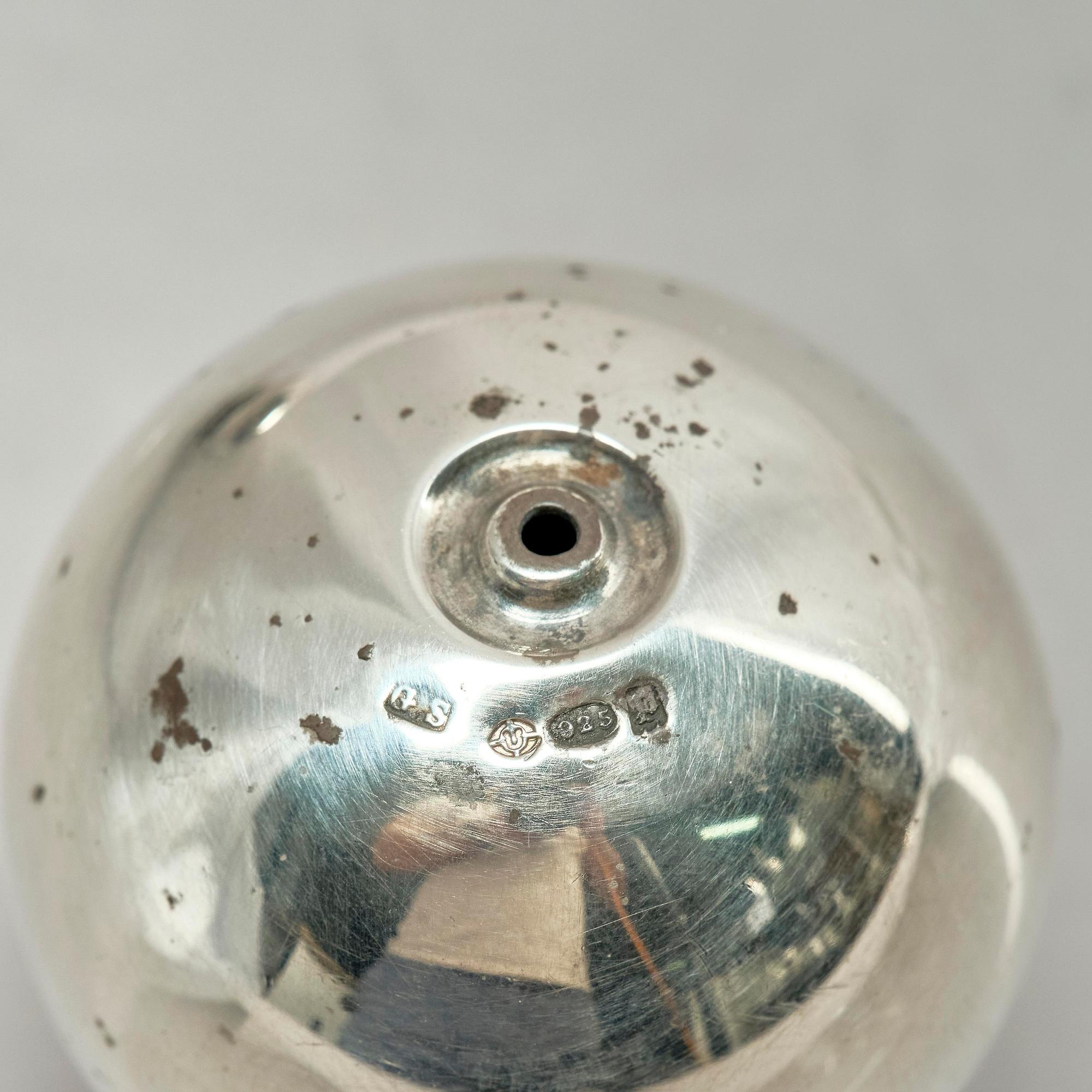 Georg Jensen, a pair of sterling silver salt shakers, model 'Pyramid/ Pyramide', design Harald Nielsen, no 632, Copenhagen after 1945.