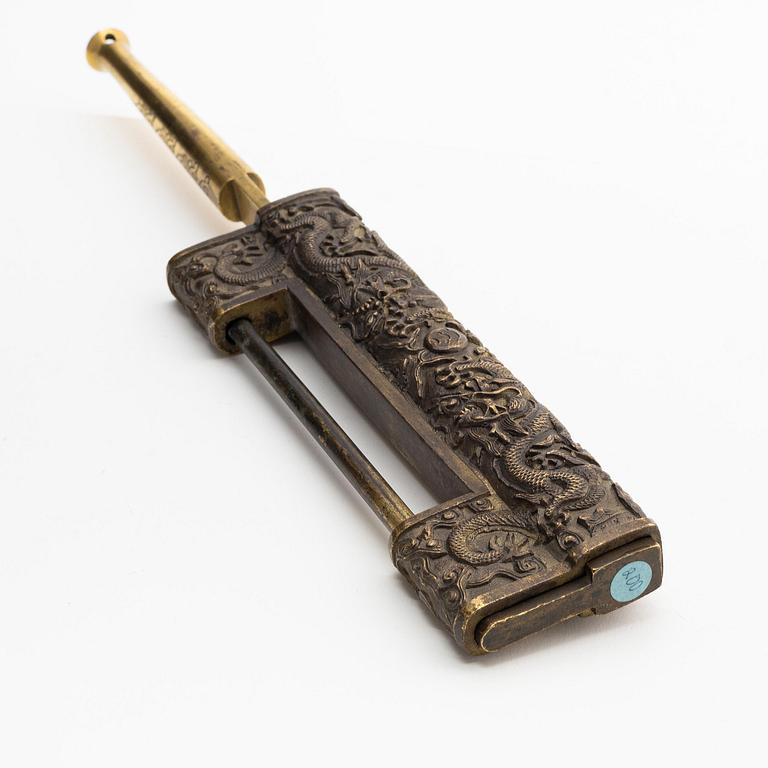 A Chinese gilt five-clawed 'dragon' lock, Qing dynasty, Qianlong (1736-95).
