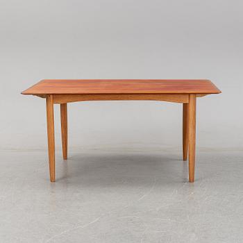 A 1950/60's dining table from Slagelse Møbelvaerk A/S with two additional leaves.