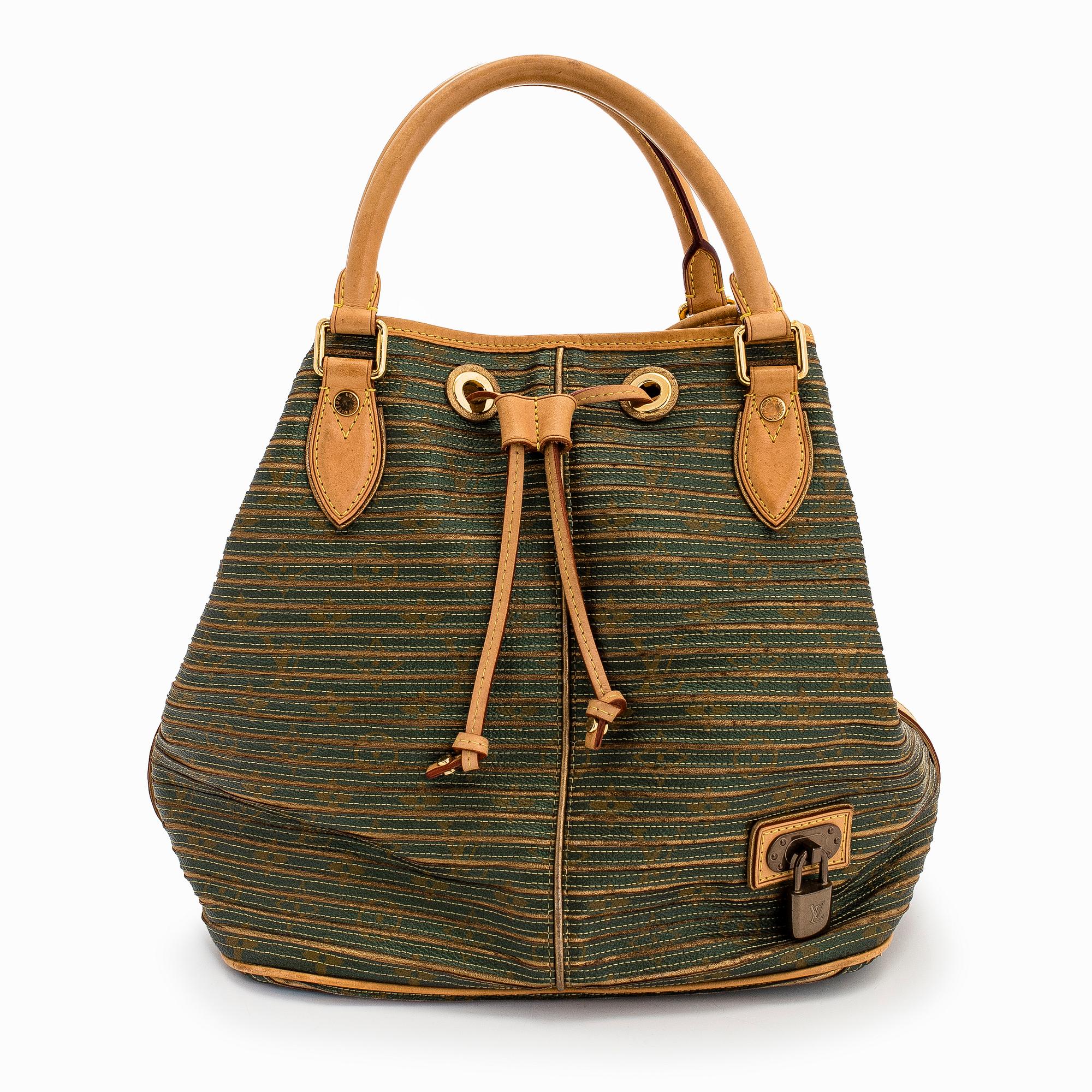 Louis Vuitton, an "Eden Neo" bag.
