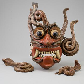 A large wooden dance mask, South-East Asia, early 20th Century.