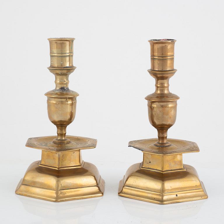 A pair of North-European Baroque brass candlesticks, circa 1700.